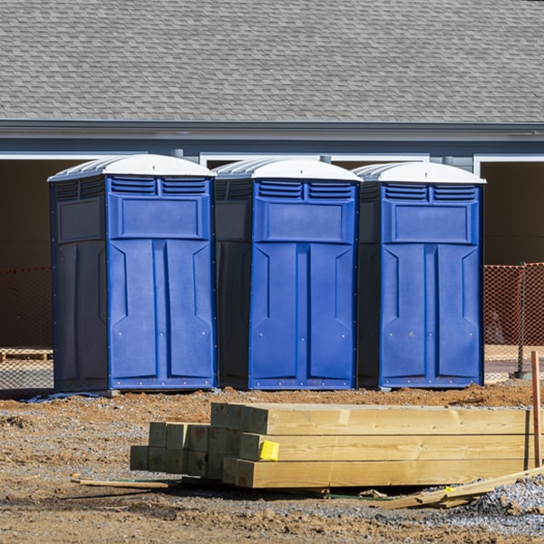 what is the cost difference between standard and deluxe portable toilet rentals in Cumminsville